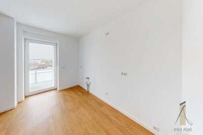 Erstbezug nach Kernsanierung! - Exklusives Wohnen mit Balkon und eigenem Garten