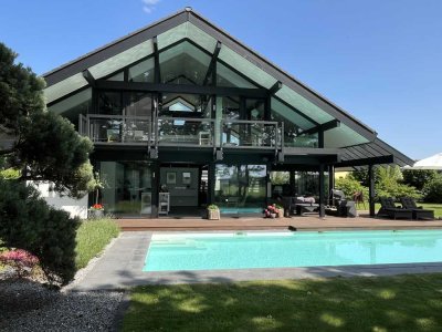 "Design trifft Natur: Ihr Traumhaus mit Pool"