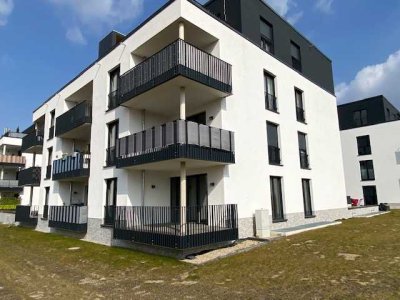 Moderne 3 Zi. Wohnung (EG) mit großer Loggia, Einbauküche und Tiefgaragenplatz in Wob-Wendschott!