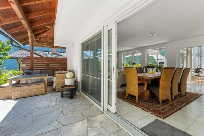 Mehr Raum. Mehr Ruhe. Mehr Ausblick - einzigartige Gartenwohnung mit Pool und Wellnessbereich