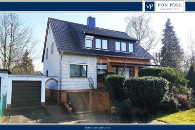 Zwei Familien - ein Zuhause:
8-Zimmer mit Garten und Garagen