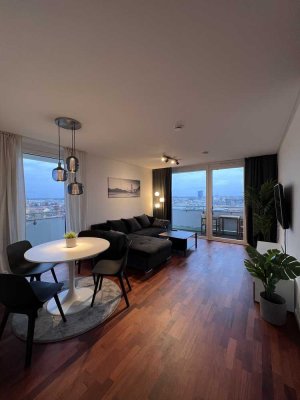 Exklusive möblierte 2-Zimmer Wohnung im 14. OG mit Balkon in Schwabing-West