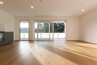 Sehr helle 5 Zimmer Familienwohnung mit westseitigem Balkon, Eigengarten und PKW-Stellplatz | inkl. Einbauküche