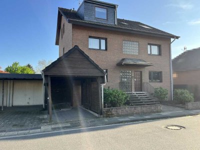 3-Zimmer Dachgeschosswohnung mit Balkon, Garage und eigenem Garten in Moers-Vennikel