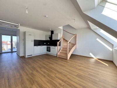 Hochwertige Dachgeschosswohnung mit Terrasse sowie Klimaanlage - Erstbezug - Unbefristet