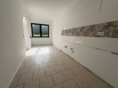 3-Zimmer-Souterrainwohnung mit Terrasse und Gartenmitnutzung