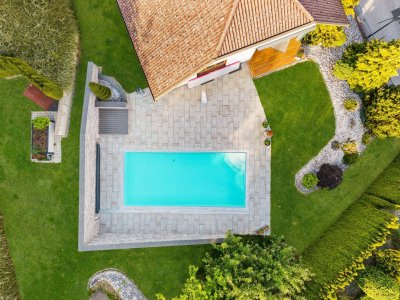 Exklusives Wohnhaus mit Pool, Gartenparadies und traumhafter Aussicht in Althofen