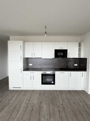 Erstbezug: Moderne 2-Raum-Wohnung in zentraler Lage mit Einbauküche und Balkon