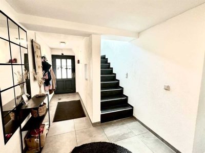 Familienfreundliches Haus mit 7 Zimmern, Garage und Terrasse – sofort bezugsfrei