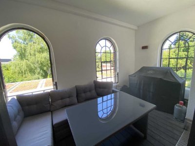 City-Loft im Obergeschoss mit historischer Loggia