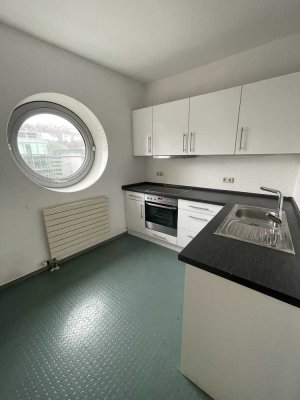 zentrale 2-Zimmer Wohnung mit Penthouse-Charakter