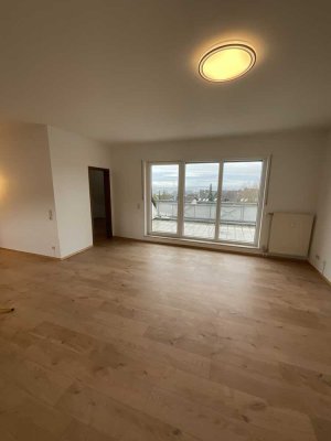 Lichtdurchflutete 2-Zimmer-Wohnung mit Terrasse u. PKW-Stellplatz in Feldrandlage/ MZ-Hechtsheim