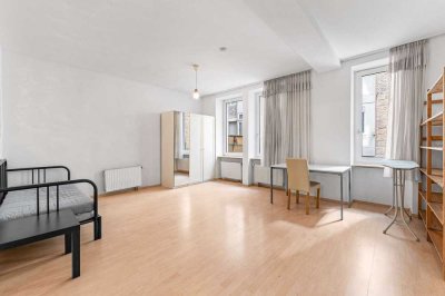 Charmante Erdgeschoss 2,5-Zimmer-Wohnung mit Stellplatz in ruhiger Hinterhoflage