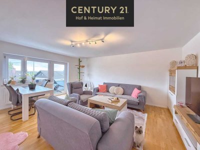 Zuhause mit XL-Potential: Modernisierte Wohnung + DG + Einzelgarage