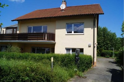 Einfamilienhaus mit Gewerbeeinheit in Mühlhausen zu verkaufen.