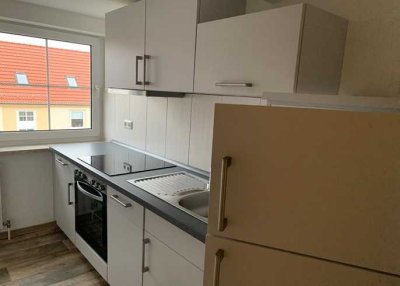 Gemütlich Dachgeschosswohnung mit Einbauküche!