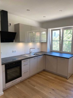 Frisch sanierte 2-Zimmer-Wohnung in Altstadtnähe mit schönem Garten