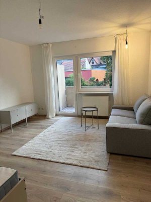 Attraktive möblierte 1-Zimmerwohnung mit Balkon und Tiefgarage in Ladenburg