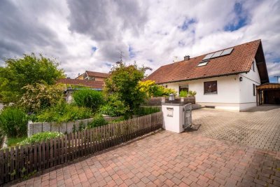 Einfamilienhaus mit Ausbaupotenzial und liebevoll gestalteter Außenanlage