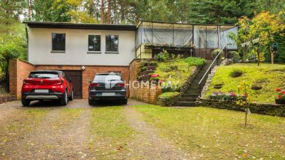 Traumhaft wohnen am See: Idyllisches Einfamilienhaus mit 5 Zimmern und großem Grundstück