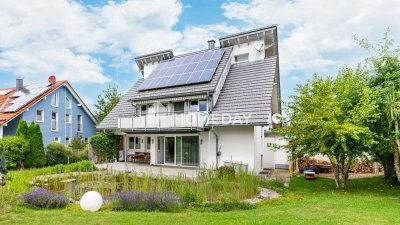 Architektenhaus mit unverbaubarem Naturblick, Geothermie & Gartenidylle
