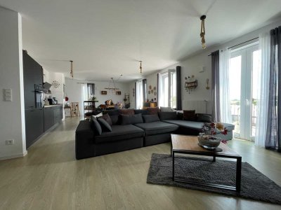 Offen gestaltete Wohnung mit zwei Dachterrassen