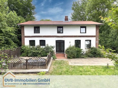Vielseitiges Haus mit Einliegerwohnung, Stall und Lagerhalle