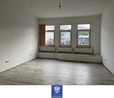 Frisch und modern sanierte Singlewohnung im separaten Anbau!