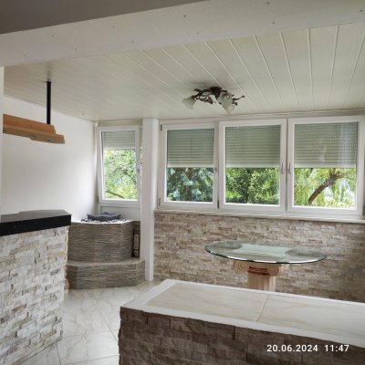 3-Zimmer Neubauwohnung mit Wintergarten und Garage