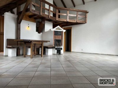 Holz, Feuer & Empore – ein Dachgeschoss der ganz besonderen Art