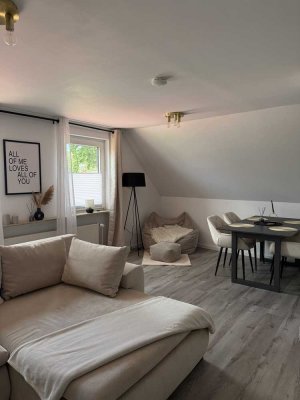 Ansprechende 3-Zimmer-DG-Wohnung mit Einbauküche in Faßberg