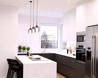 Dachgeschosswohnung in Niedrigenergiebauweise und 23m² Terrasse mit spektakulärem Fernblick.