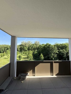Moderne Neubaueohnung mit Einbauküche - mit Balkon, Tiefgaragenstellplatz ink. 11KW Wallbox!