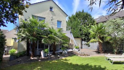 Außergewöhnlich! Palmen Oase mit freistehendem Einfamilienhaus und großem Garten in Langenfeld