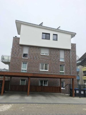 Moderne 2-Zimmer-Penthouse-Wohnung mit Balkon und Carport in zentraler Lage von Langenfeld