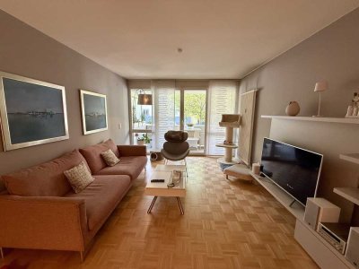 Möblierte 4-Zimmer-Wohnung mit Südwestbalkon, Privatgarten und TG-Stellplatz in Bestlage