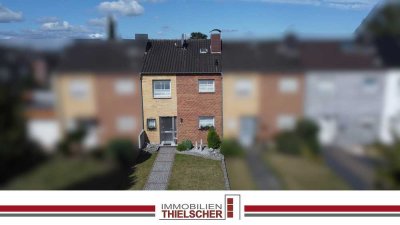 Charmantes Reihenmittelhaus mit schön angelegtem Garten und gutem Raumkonzept in zentraler Lage