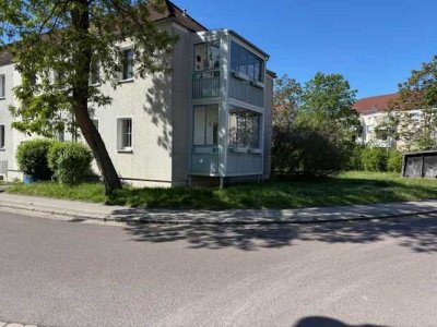 Mit Balkon im Erdgeschoss