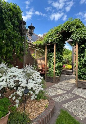 Schöne 4 Zimmer Erdgeschosswohnung mit Garten im Zweifamilienhaus