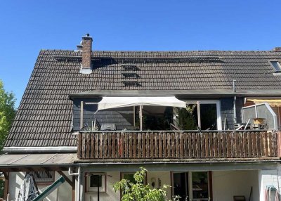 Freundliche Maisonette Wohnung mit Terrasse, Werkstatt und Gartennutzung