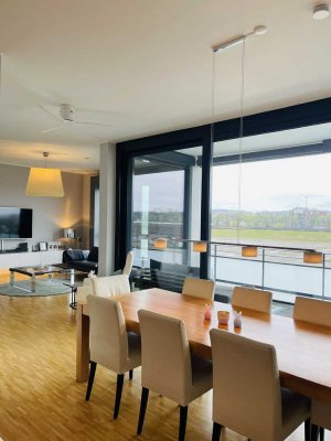 Exklusiv: Luxuriöse und stilvolle CarLoft-Wohnung mit tollem Ausblick