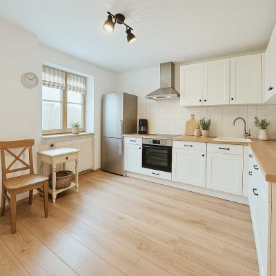 Erstbezug nach Sanierung: attraktive 3-Zimmer-Wohnung mit Terrasse und Garten