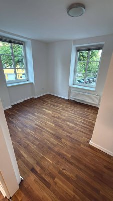 Charmante Altbauwohnung am Mühlbach mit Blick auf den Ledererturm – 52 m²