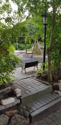 2-Zimmer-Wohnung mit Terrasse und Gartenanteil im 3-Seiten-Hof