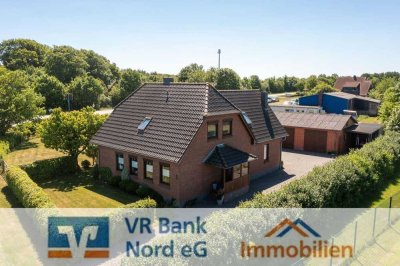 Sehr gepflegtes Einfamilienhaus mit Doppelgarage und Werkstatt in zentraler Lage