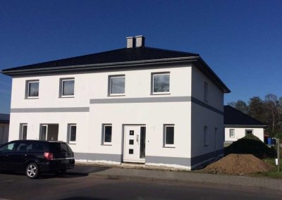 Helle Doppelhaushälfte mit Garten in Dessau