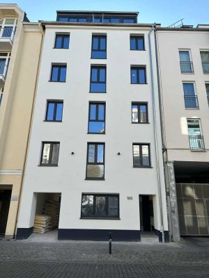 Neubau nach Sanierung: Stilvolles 16-Zimmer-Mehrfamilienhaus mit geh. Innenausstattung und EBK
