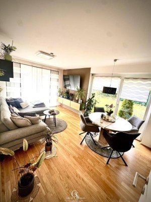 Moderne Neubauwohnung mit großem Garten: 3 Zimmer, Terrasse und Carports!