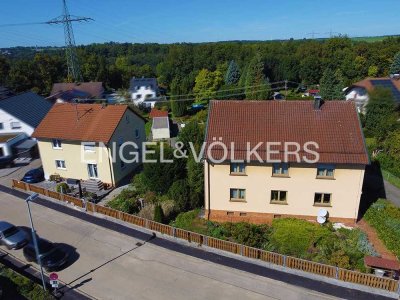 Gesamtpaket mit Potential: Einfamilienhaus, Mehrfamilienhaus & reichlich Bauland