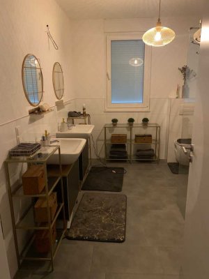 Gartenwohnung mit überdachter Terrasse